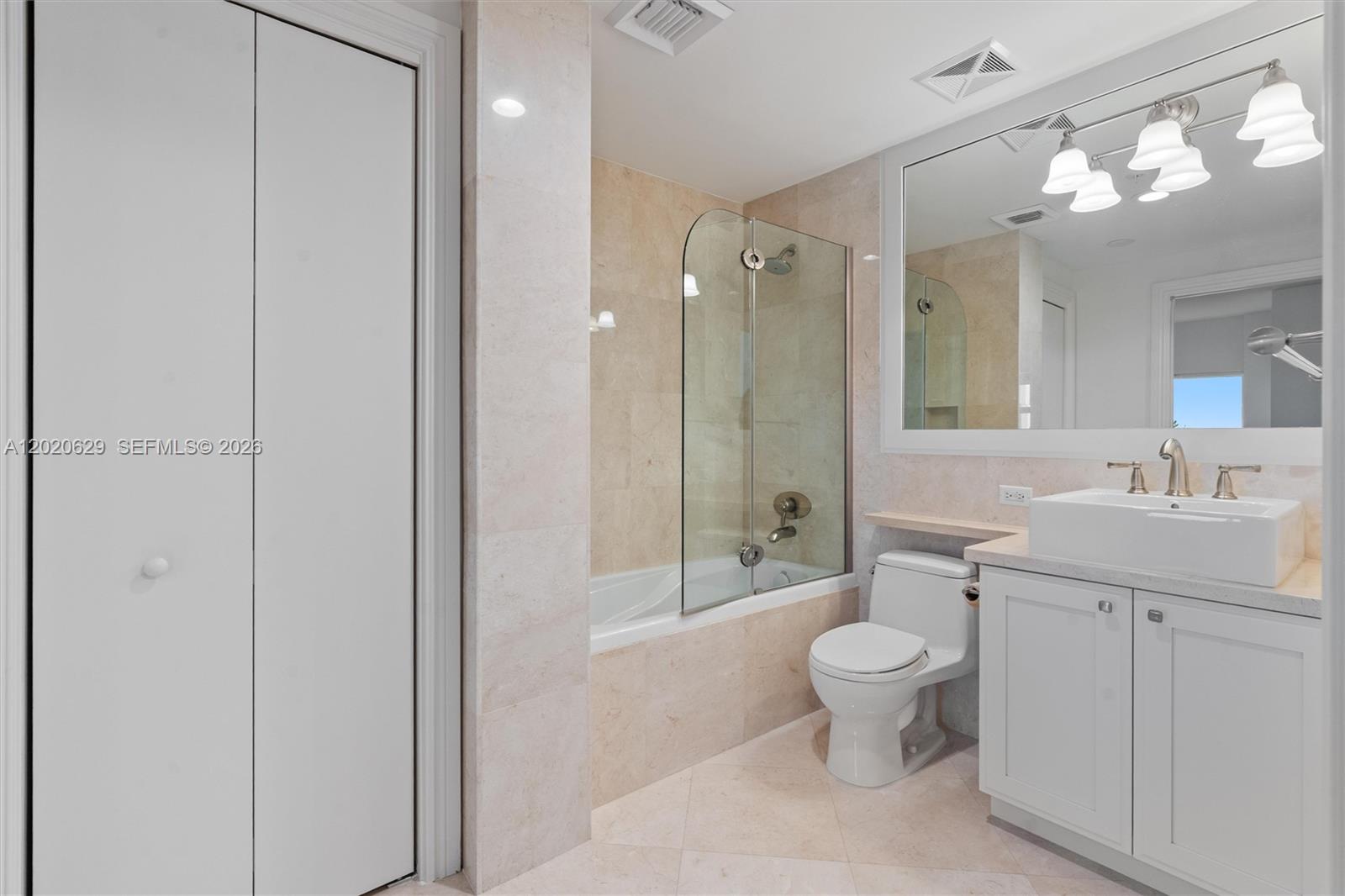 455 East Palmetto Park Road, Unit 4 Boca Raton, FL 33432 - Photo 24 of 30 a bathroom with a sink a toilet and shower
