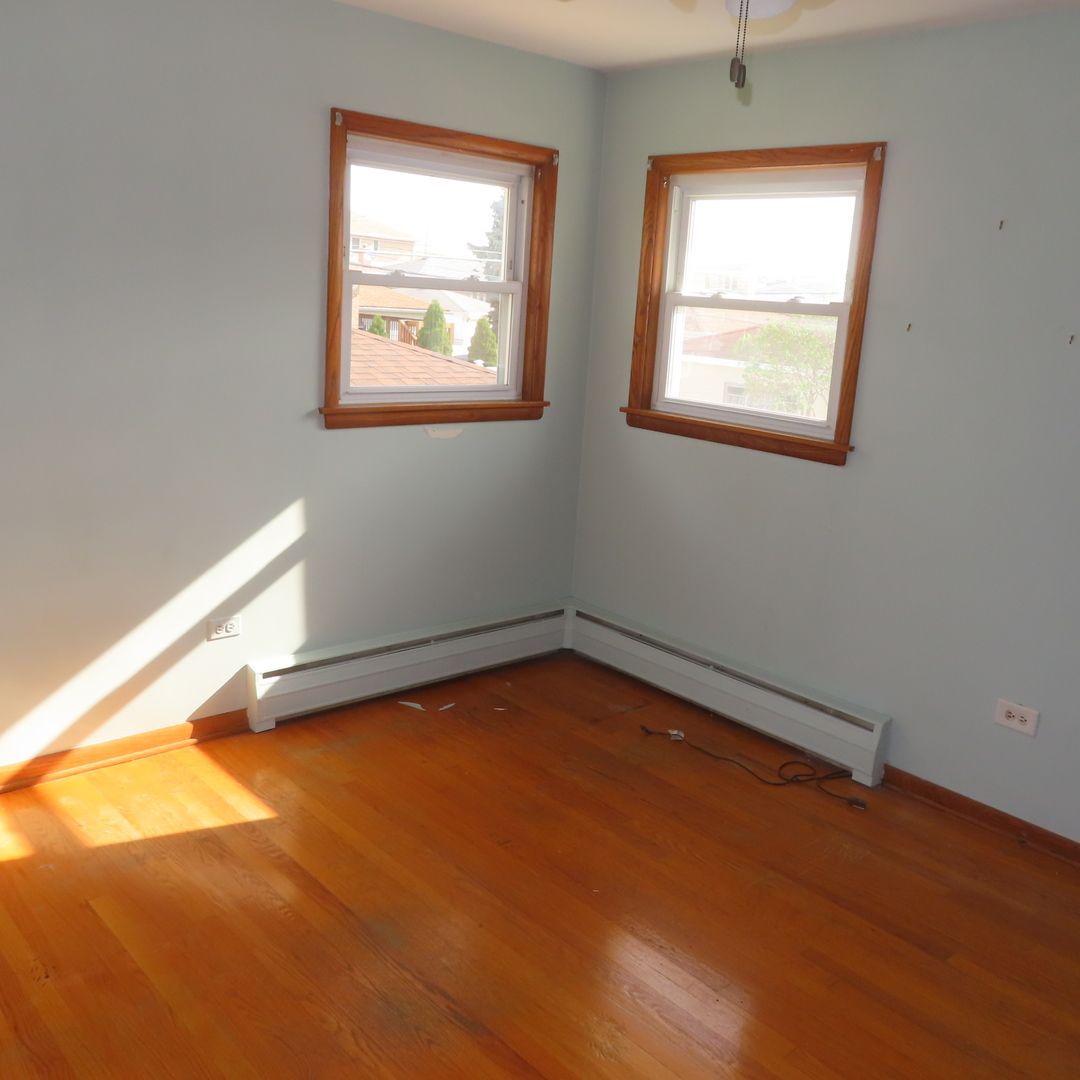 8316 Coral Drive Norridge, IL 60706 - Photo 2 of 42 an empty room with a window