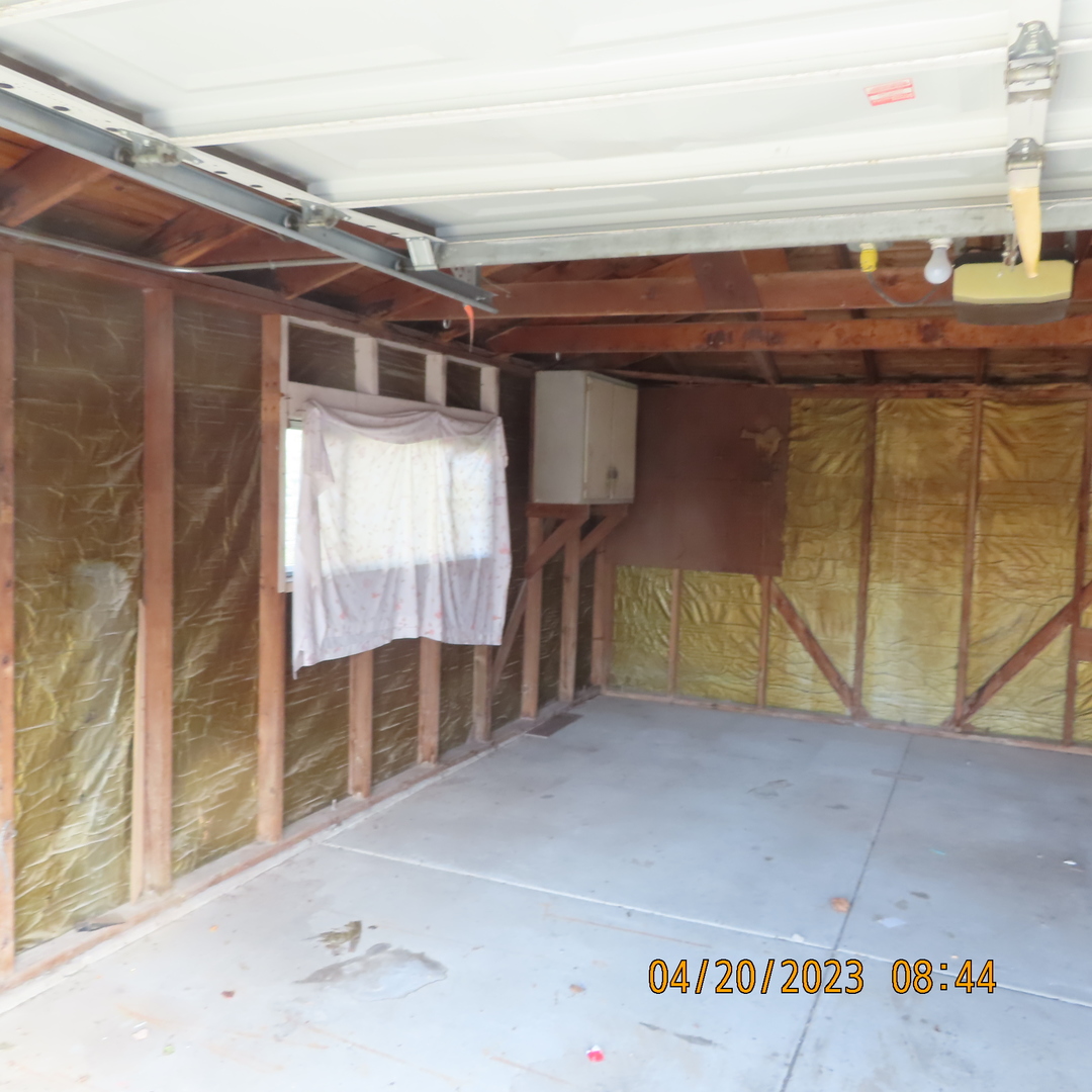 8316 Coral Drive Norridge, IL 60706 - Photo 32 of 42 a view of walk in closet with clothes and shoes