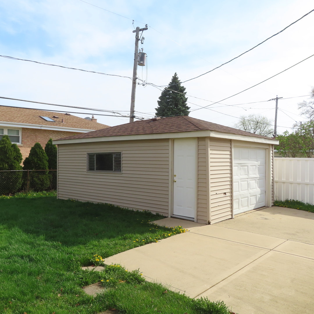 8316 Coral Drive Norridge, IL 60706 - Photo 34 of 42 a view of a backyard with plants