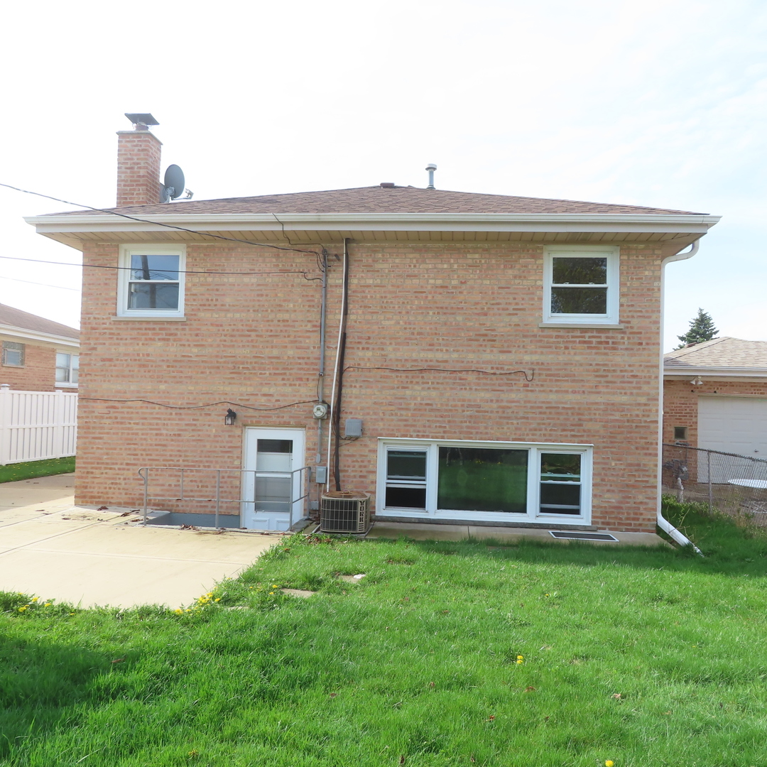 8316 Coral Drive Norridge, IL 60706 - Photo 36 of 42 a view of a house with a yard