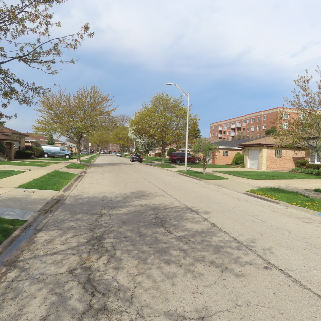 8316 Coral Drive Norridge, IL 60706 - Photo 39 of 42 a view of a city street with a building