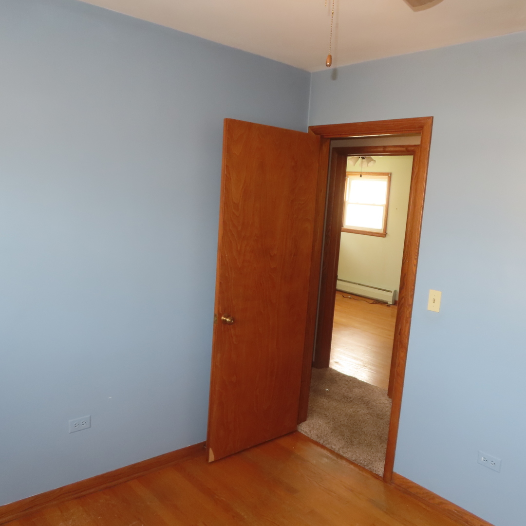 8316 Coral Drive Norridge, IL 60706 - Photo 10 of 42 a view of a small space with a door