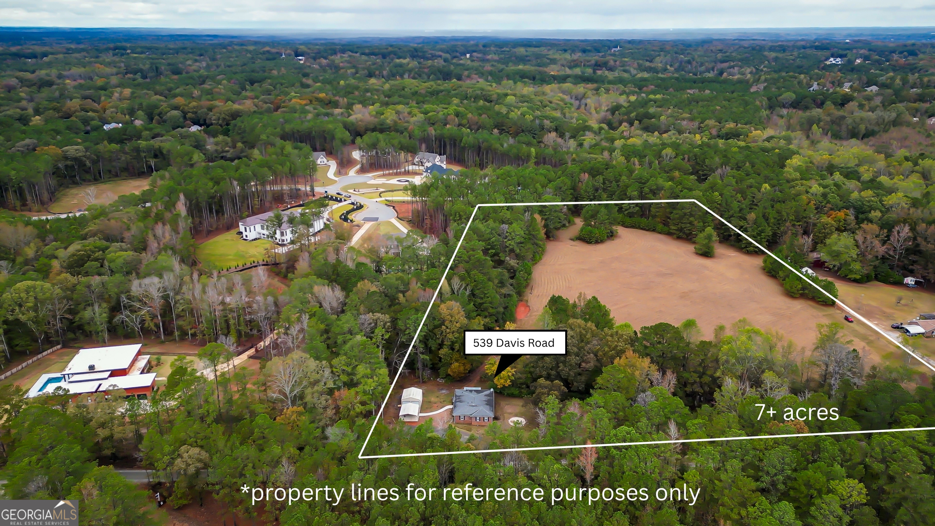 539 Davis Road Fayetteville, GA 30215 - Photo 1 of 1 a view of a city from a balcony
