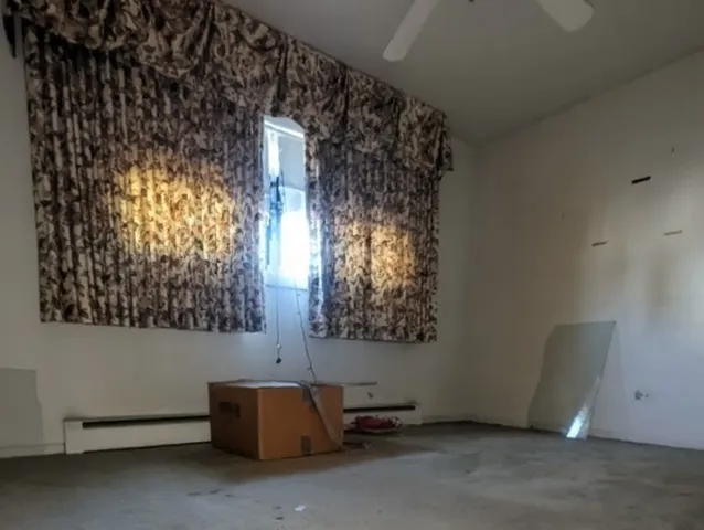 an empty room with windows