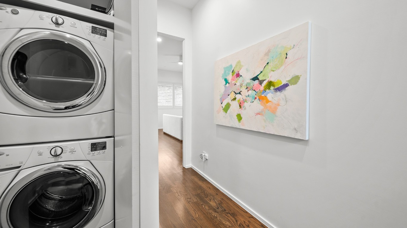 4302 Rose Street Houston, TX 77007 - Photo 17 of 25 a view of a hallway with washer and dryer