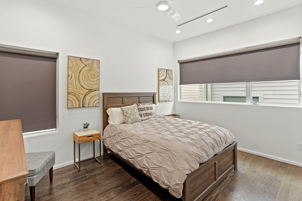 4302 Rose Street Houston, TX 77007 - Photo 18 of 25 a bedroom with a bed and window
