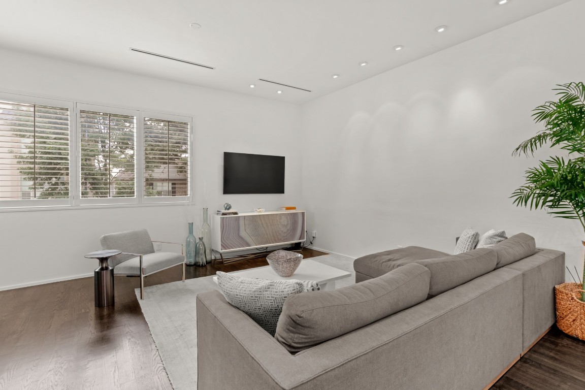 4302 Rose Street Houston, TX 77007 - Photo 7 of 25 a living room with furniture and a flat screen tv