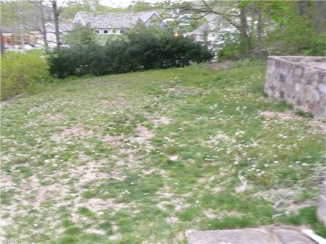 69 Rustic Terrace Bristol, CT 06010 - Photo 1 of 1 a backyard of a house with lots of green space