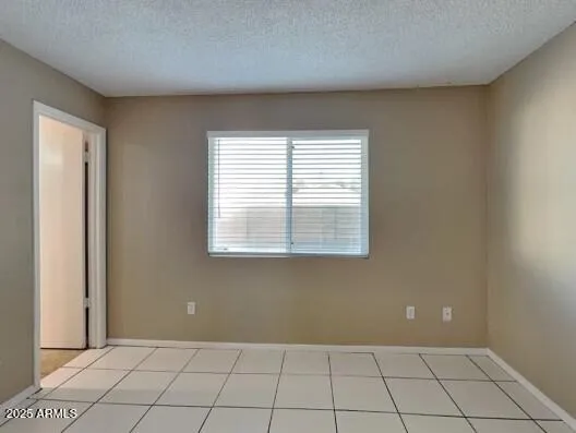 a view of an empty room with window