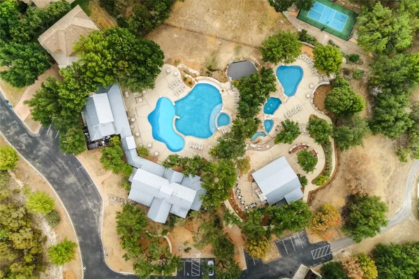 a view of an outdoor space and tennis court