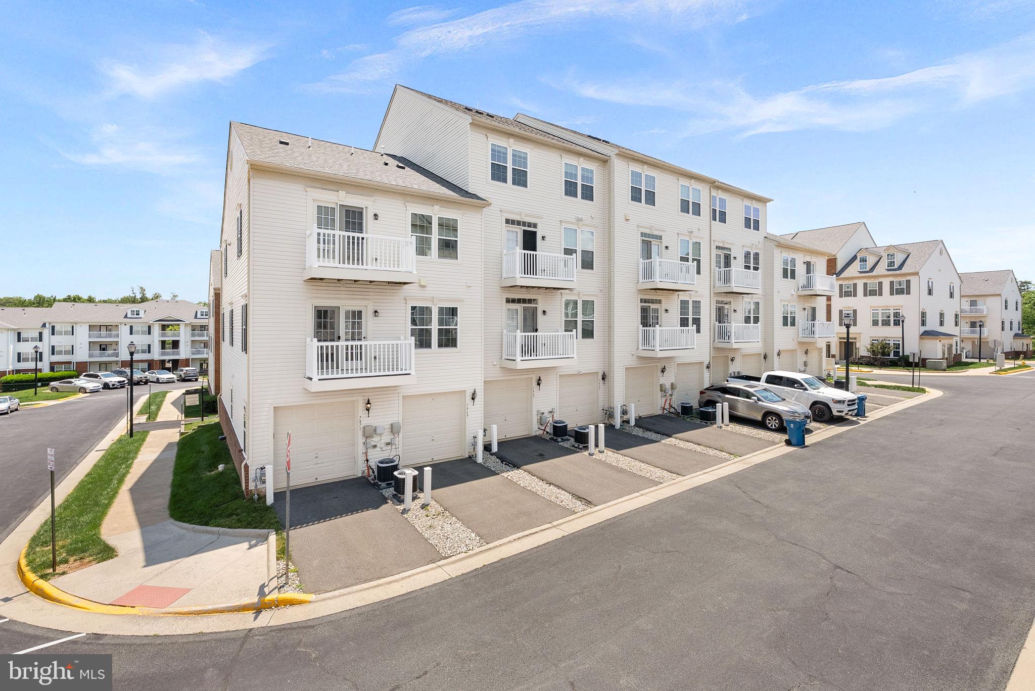 7471 Brunson Circle, Unit 10A Gainesville, VA 20155 - Photo 25 of 30 a view of a large building