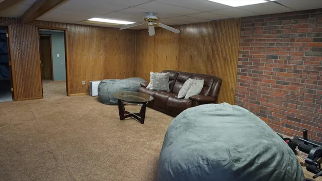 a living room with furniture and a rug