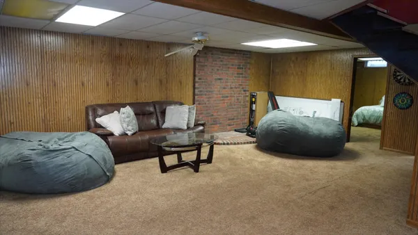 a living room with furniture and a couch