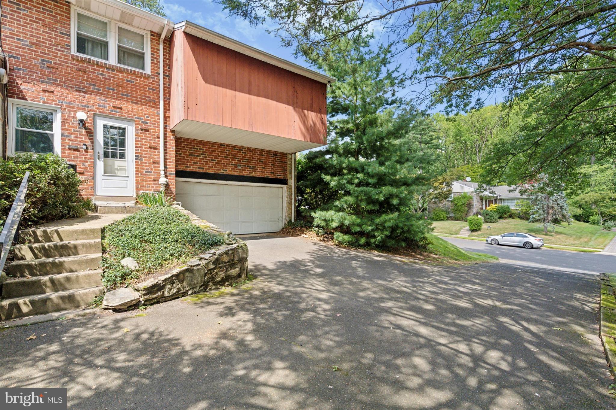 990 Indian Creek Road Jenkintown, PA 19046 - Photo 43 of 58 a view of a house with a yard