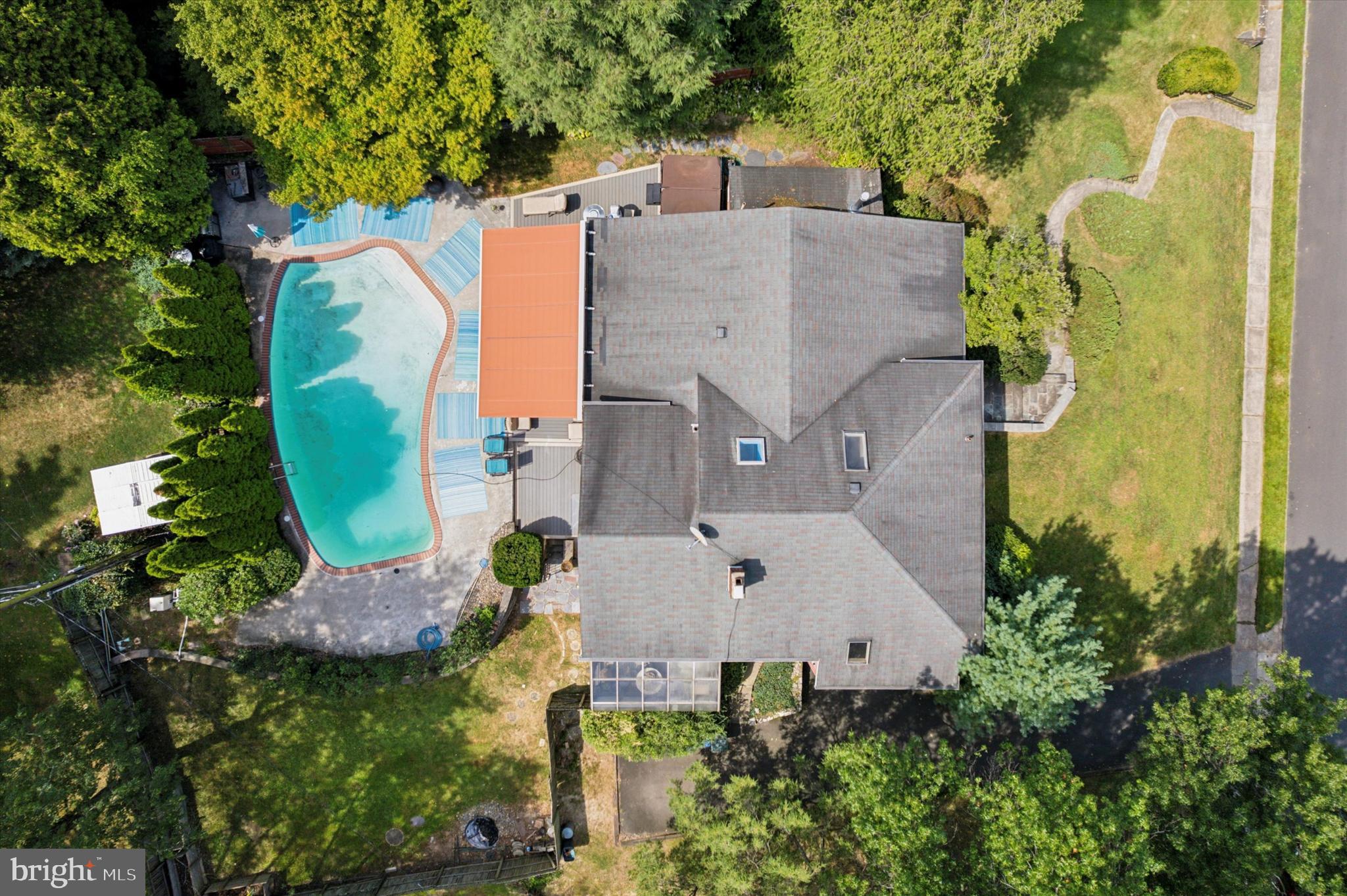 990 Indian Creek Road Jenkintown, PA 19046 - Photo 55 of 58 an aerial view of a house with a swimming pool