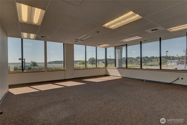 a view of an empty room with a sliding door