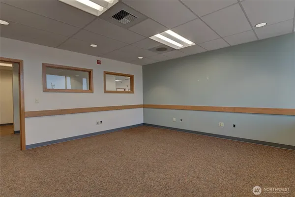 a view of an empty room with a window