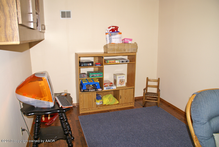 8302 Ranier Drive Amarillo, TX 79110 - Photo 13 of 32 a room with storage and utility