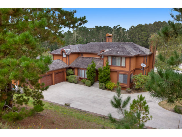 1151 Sunshine Valley Road Montara, CA 94037 - Photo 1 of 23 a view of house with outdoor space and garden