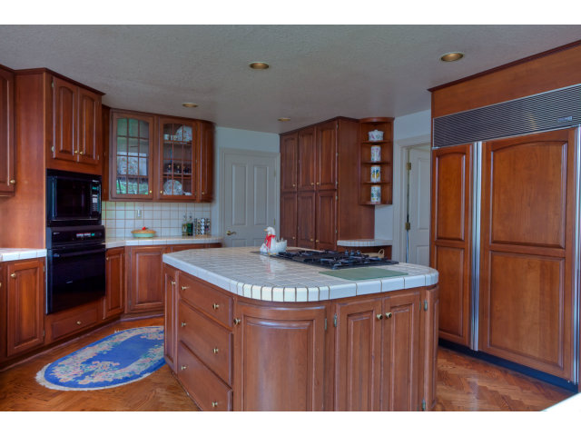 1151 Sunshine Valley Road Montara, CA 94037 - Photo 11 of 23 a kitchen with stainless steel appliances granite countertop a stove a sink and a refrigerator