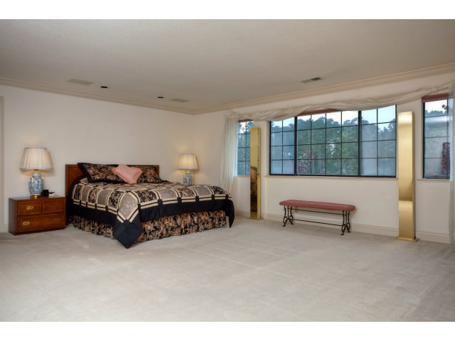 1151 Sunshine Valley Road Montara, CA 94037 - Photo 14 of 23 a bedroom with a bed and a night stand