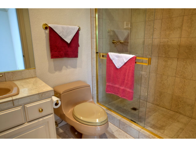 1151 Sunshine Valley Road Montara, CA 94037 - Photo 18 of 23 a bathroom with a toilet a sink and shower