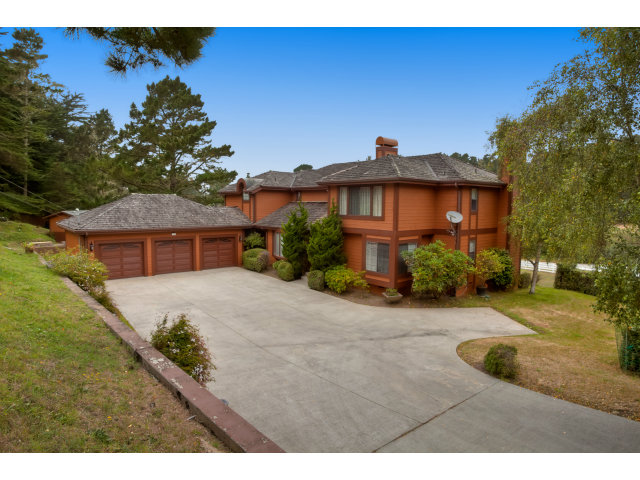 1151 Sunshine Valley Road Montara, CA 94037 - Photo 2 of 23 a view of a house with a yard