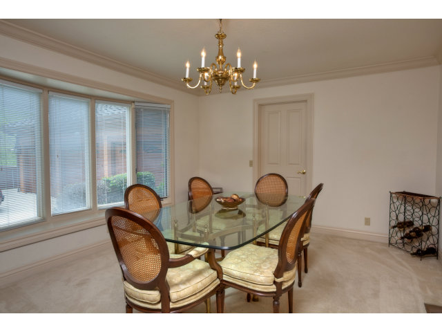 1151 Sunshine Valley Road Montara, CA 94037 - Photo 5 of 23 a dining room with furniture and chandelier