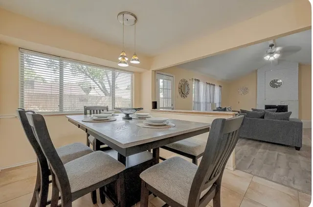 a table and chairs in a patio