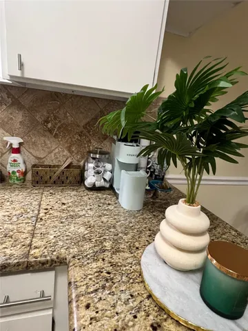 a vase of flowers sitting on a table