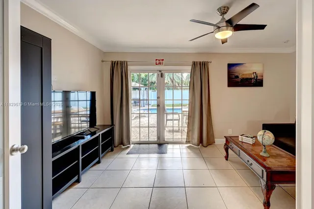 a room with furniture and flat screen tv