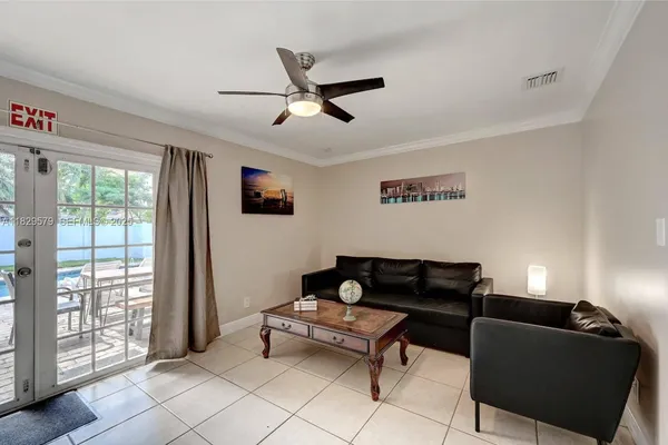 a living room with furniture and a window