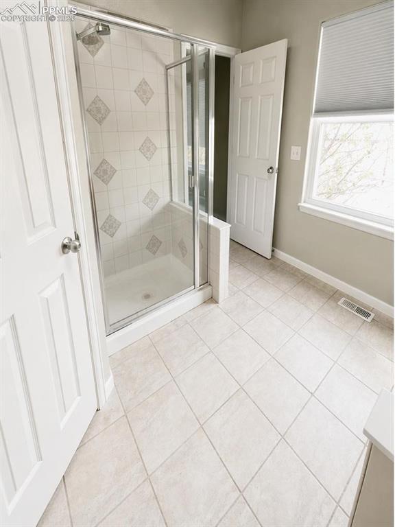 9212 Oakmont Road Peyton, CO 80831 - Photo 15 of 23 a bathroom with a shower