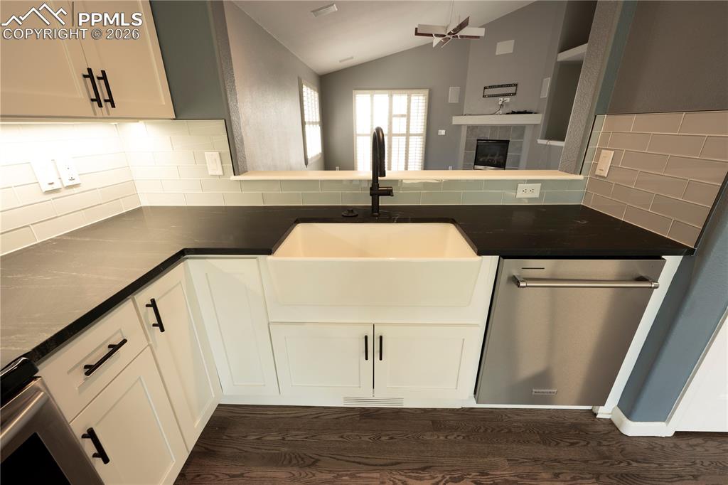 9212 Oakmont Road Peyton, CO 80831 - Photo 4 of 23 a view of a kitchen with a sink and dishwasher