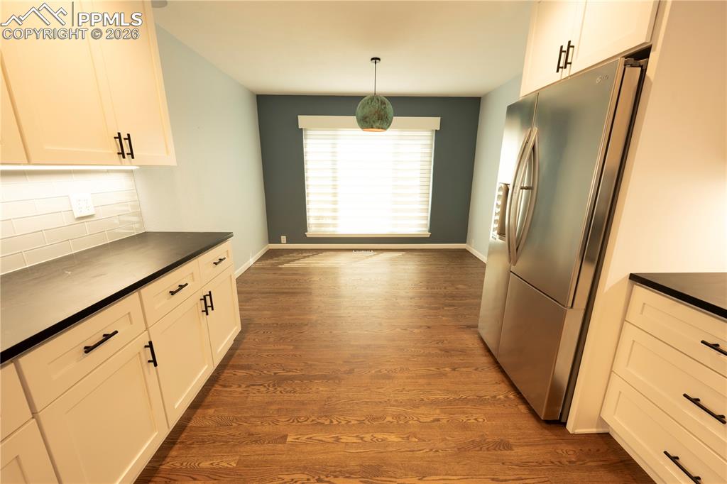 9212 Oakmont Road Peyton, CO 80831 - Photo 6 of 23 a view of a kitchen with a sink and dishwasher