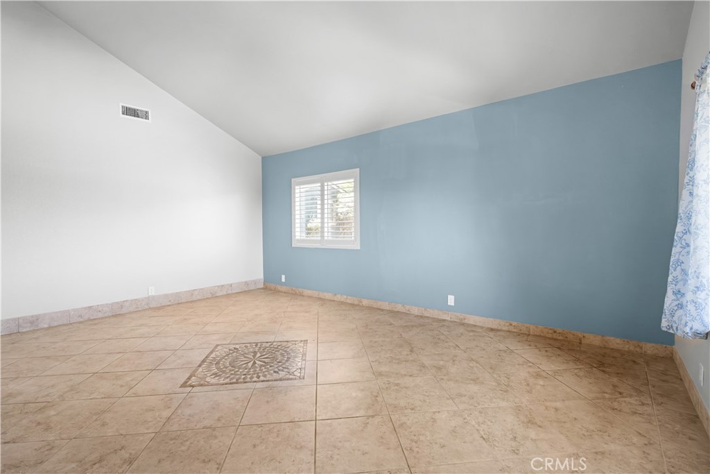 9046 Culpepper Street Rancho Cucamonga, CA 91730 - Photo 7 of 66 Living Room With Cathedral Ceilings