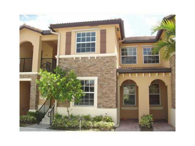 1650 Northeast 33rd Road, Unit 108 Homestead, FL 33033 - Photo 2 of 36 Exterior Front