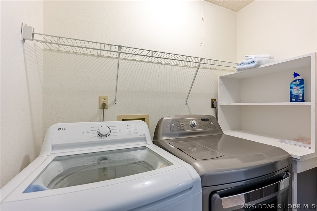 1670 Bittersweet Road Lake Ozark, MO 65049 - Photo 25 of 33 Hallway Laundry Area