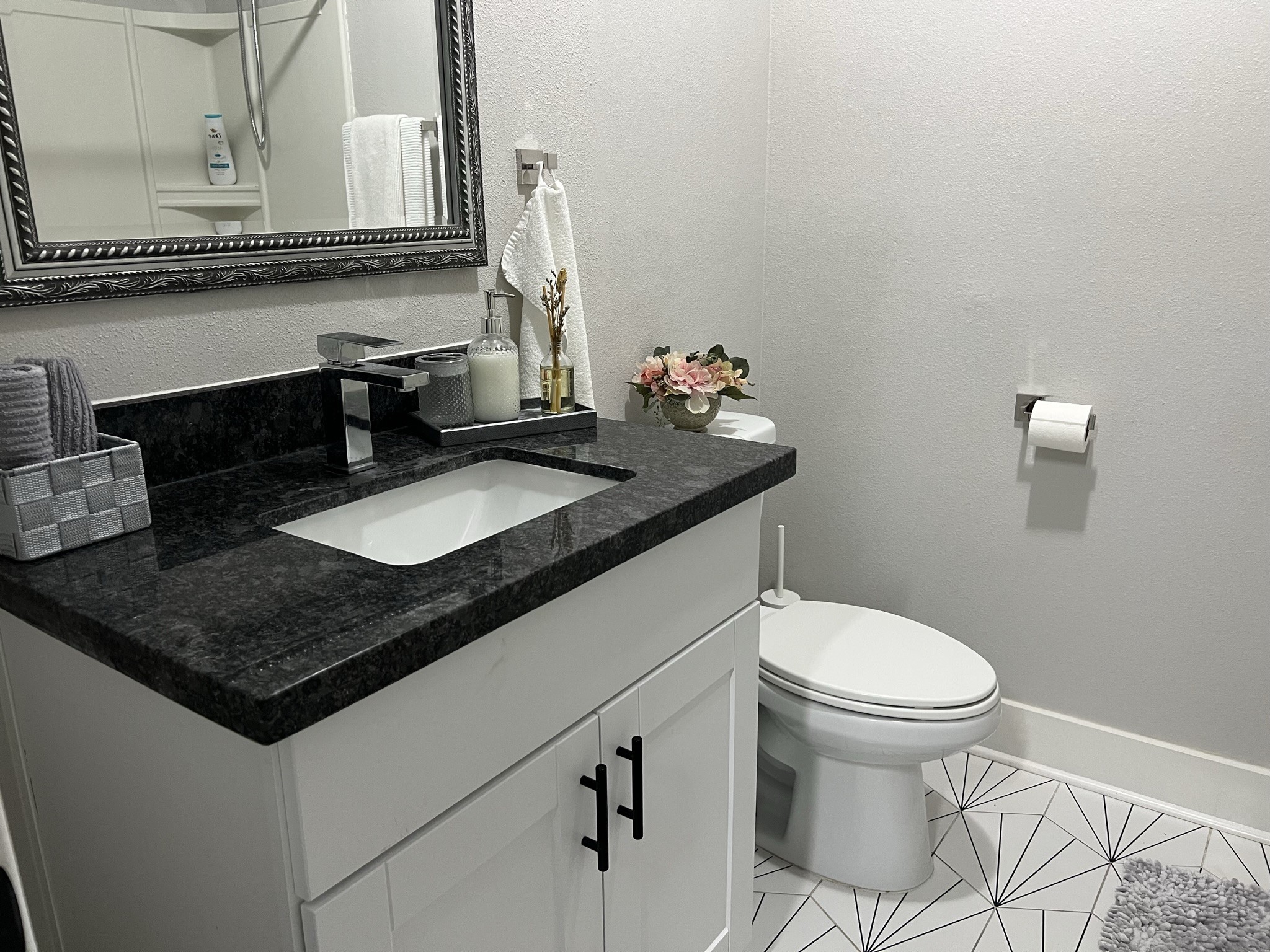 220 Redan Street, Unit A Houston, TX 77009 - Photo 15 of 22 a bathroom with a sink and a toilet