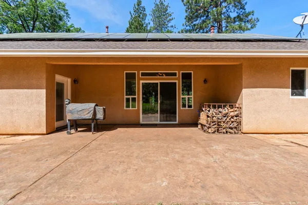 a view of outdoor space with wooden fence