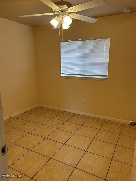 5130 26th Street Southwest Lehigh Acres, FL 33973 - Photo 9 of 10 a view of empty room with wooden floor