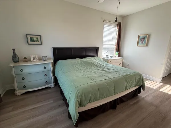 an aerial view of a house with garden space and outdoor seating
