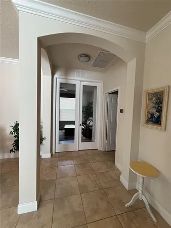 a kitchen with stainless steel appliances granite countertop a refrigerator stove and sink