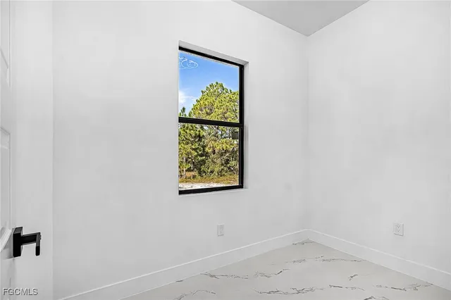 an empty room with a window