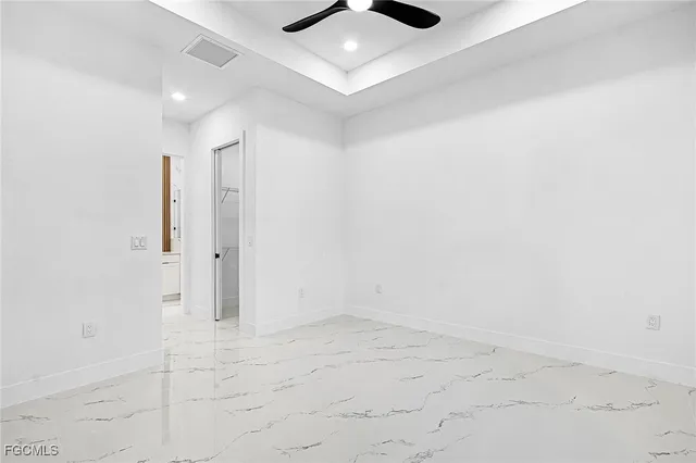 an empty room with shelves