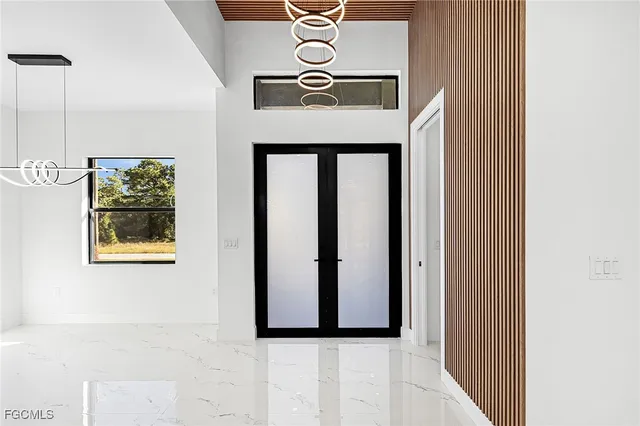 a view of a hallway with windows