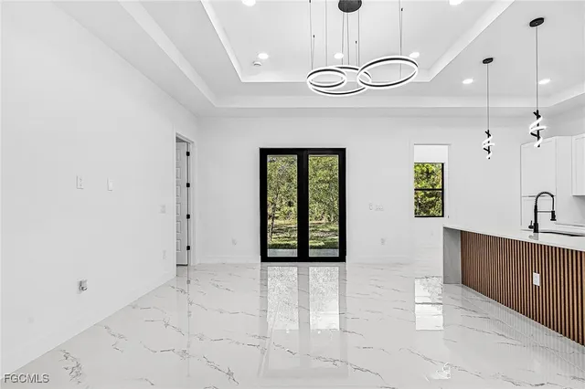 a view of a kitchen with windows
