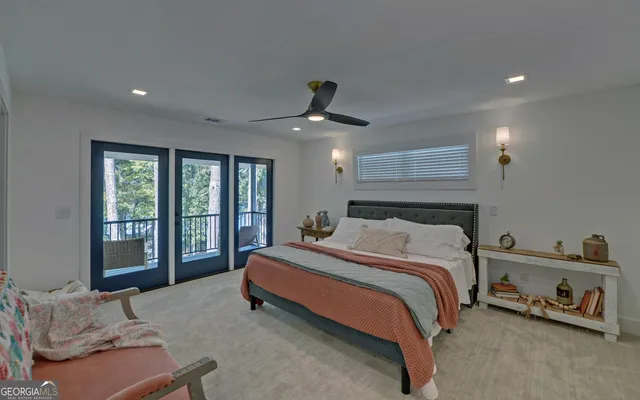 a kitchen with cabinets appliances a sink and a window
