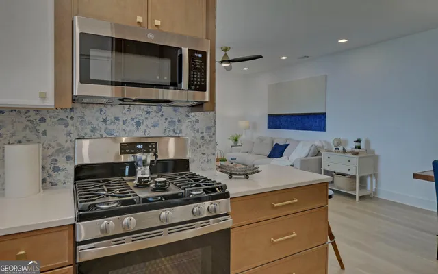 a bathroom with a sink a mirror and a shower